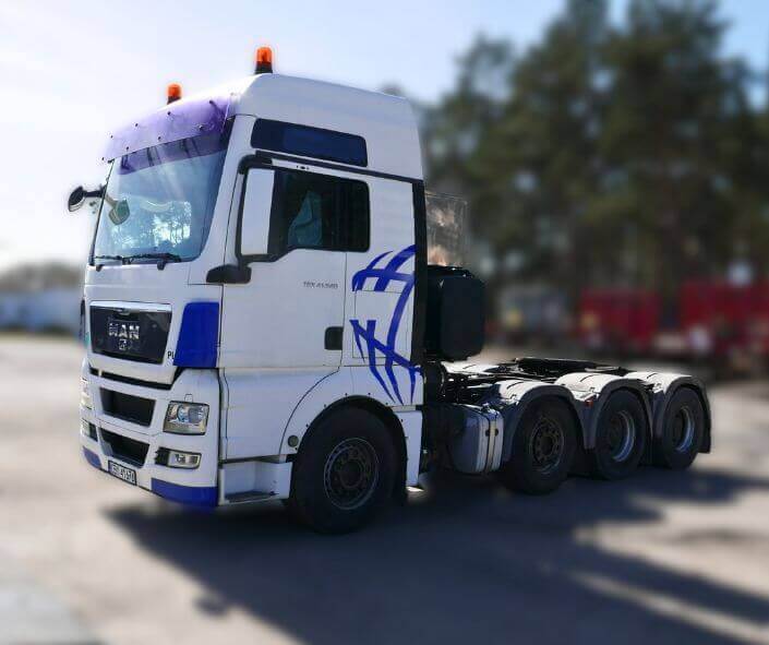 Używany ciągnik siodłowy MAN TGX 41.540 z manualną skrzynią biegów, 8x4